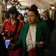 Members of the public display their covid-19 vaccination passes as they arrive at Heaven nightclub ahead of a performance by the House Gospel Choir on December 15, 2021 in London, United Kingdom.